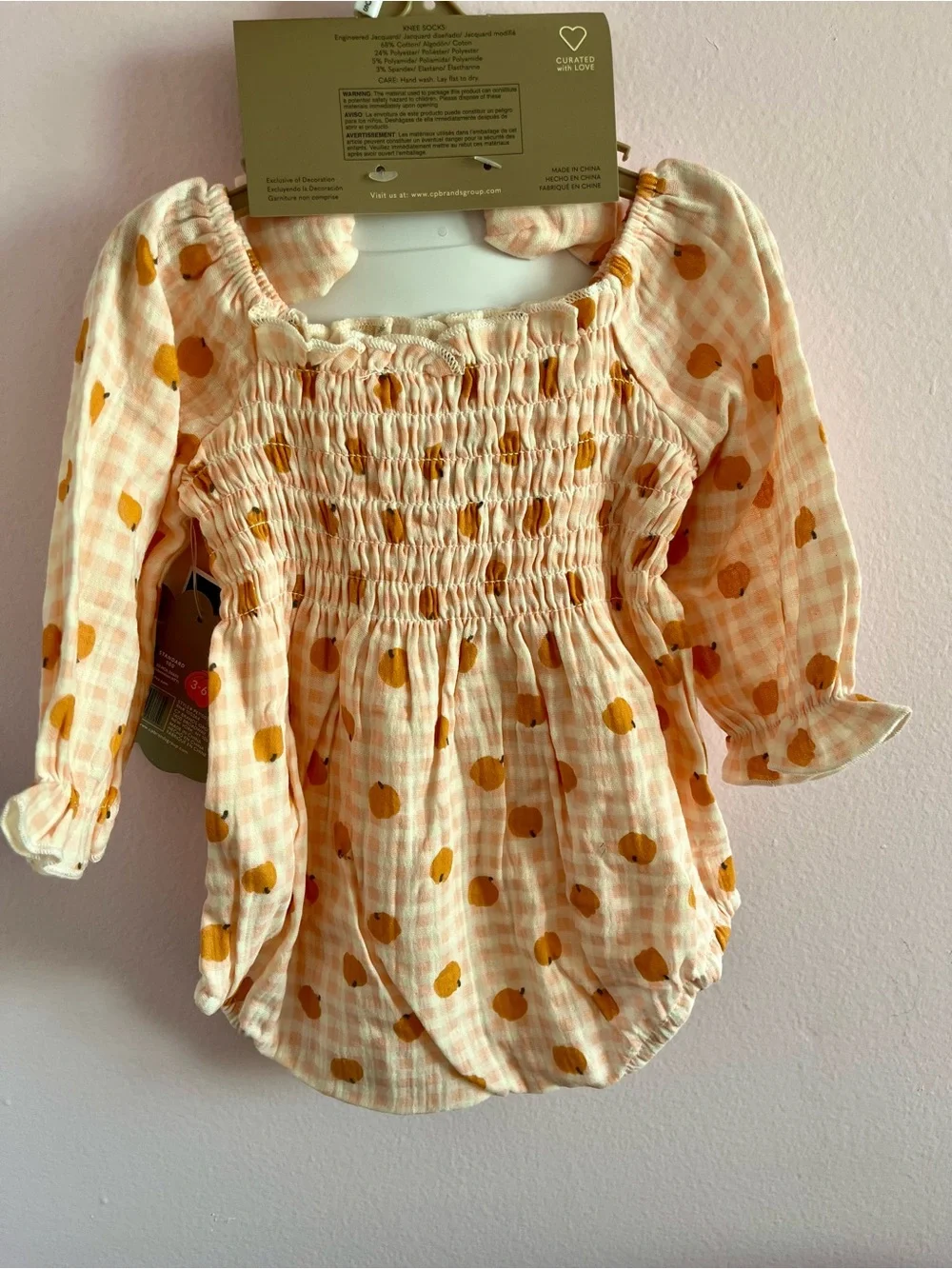 chick pea peach gingham romper set with cream socks and bow